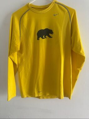 Nike Yellow Long-Sleeve Dri-FIT Top with Black Bear Graphic